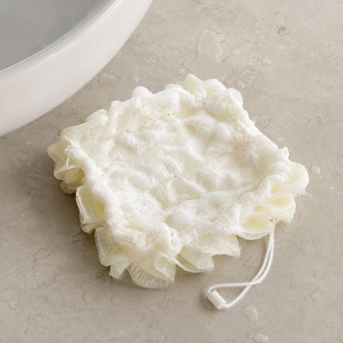 Exfoliating Shower Ball with Built-In Soap Dispenser – 2-in-1 Loofah Body Scrubber